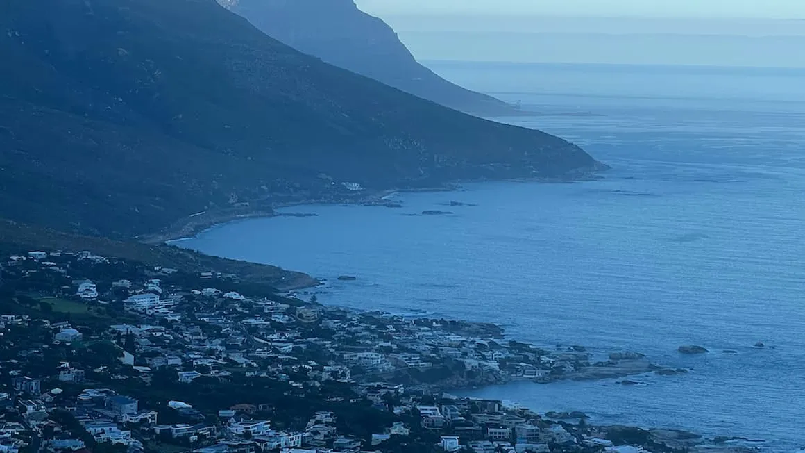 a view of cape towns ocean and mountains from a high viewpoint