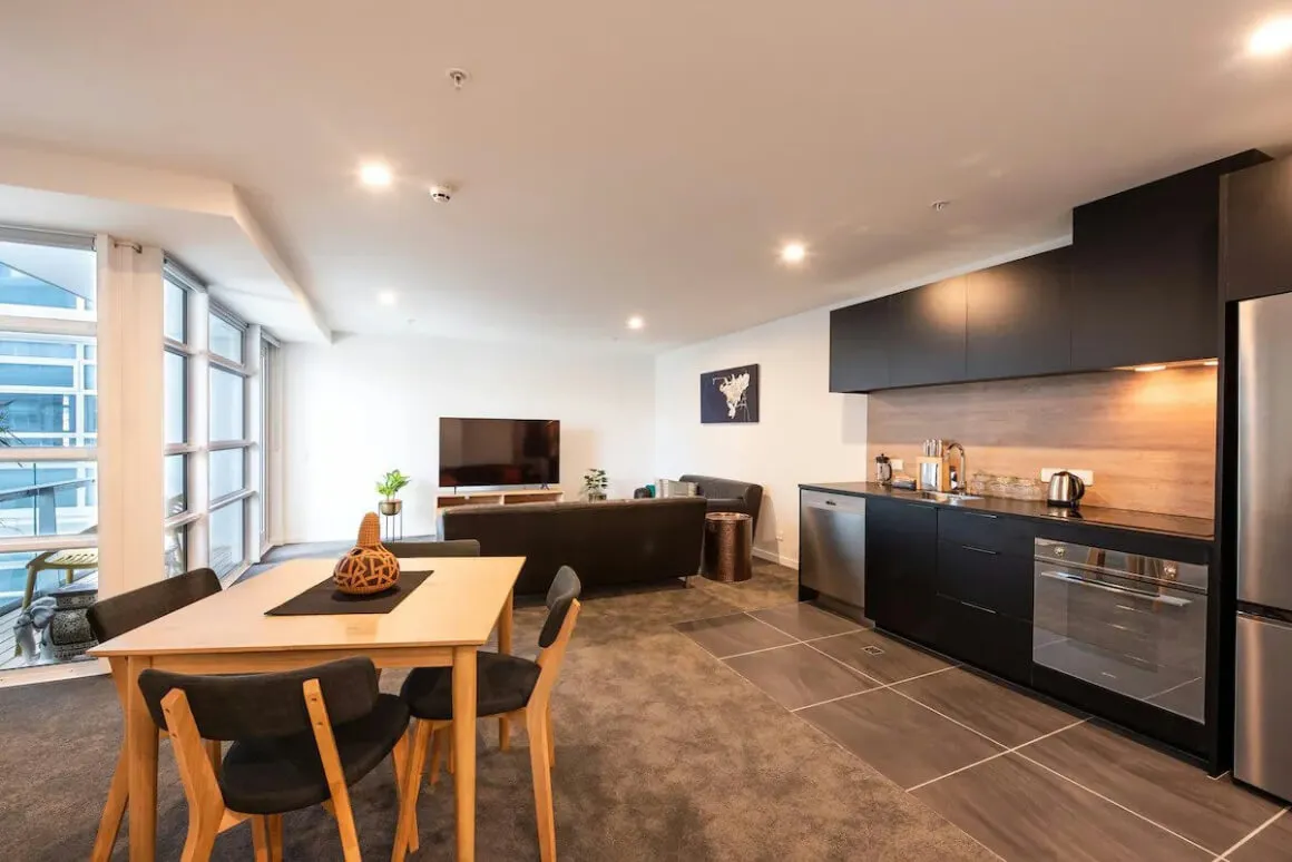 Modern Living at Pinnacle on Victoria. Sophisticated, simple dining and kitchen room.