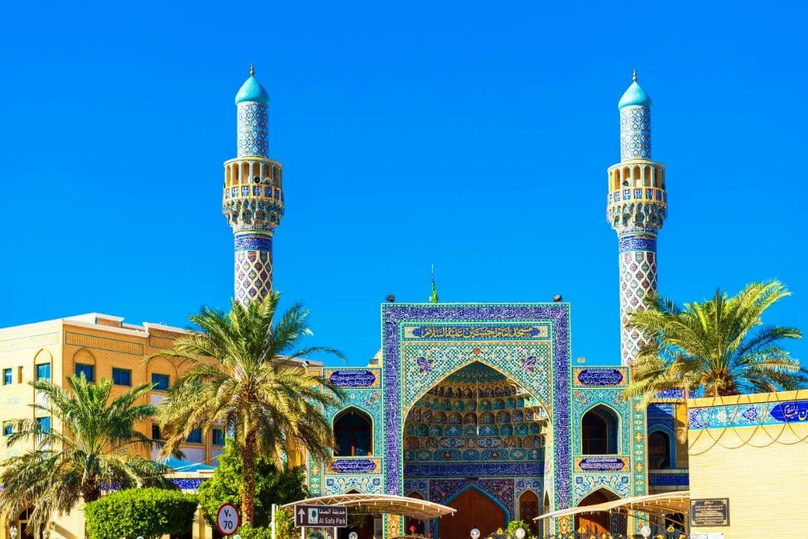 Stunning architecture with blue and beige patterns at the Iranian Mosque, Dubai
