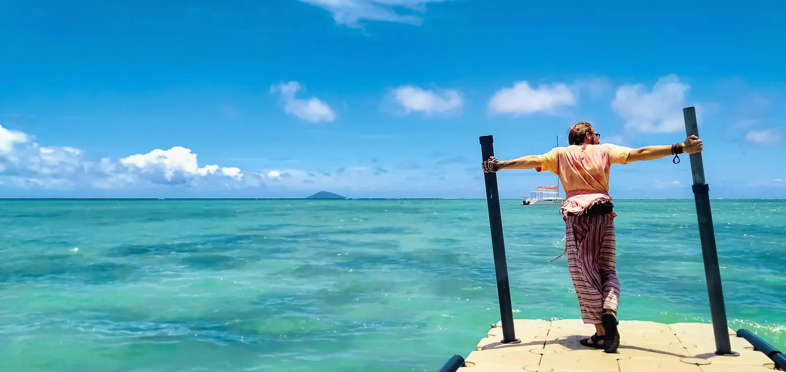 Posing against Grand Gaube waters - a beautiful place to visit in Mauritius