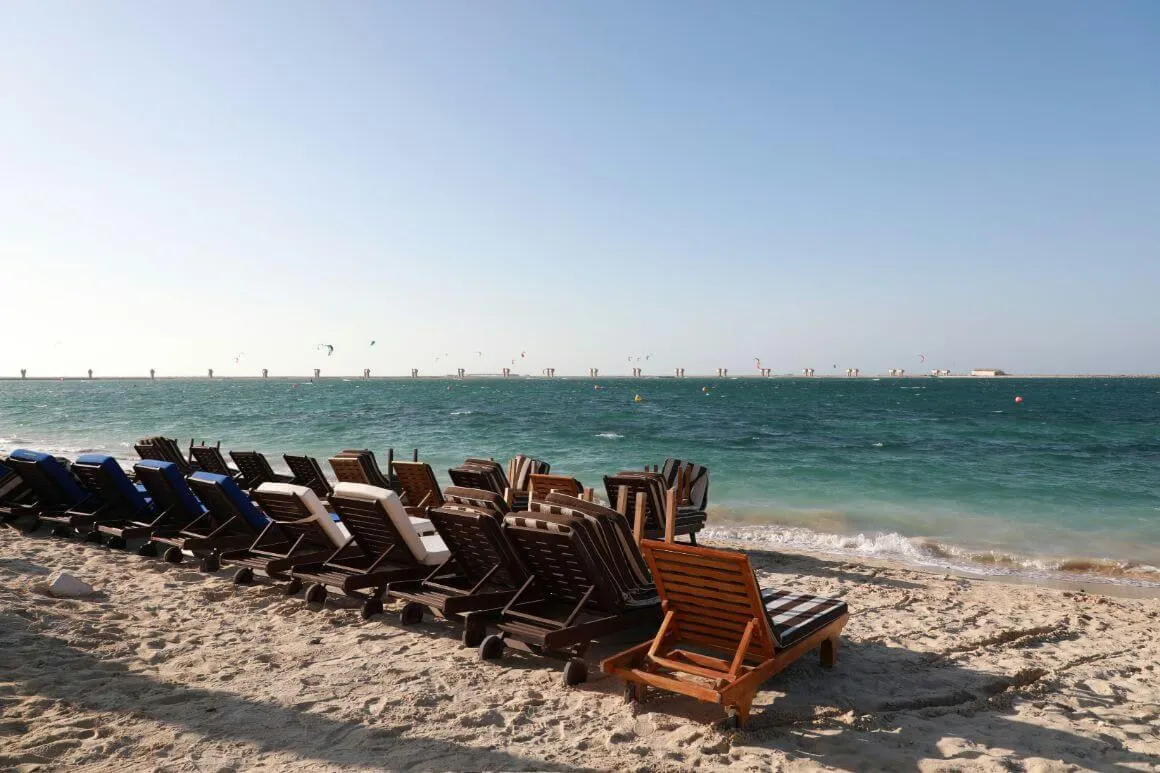 Lounge chairs lining at Jebel Ali Beach, Dubai