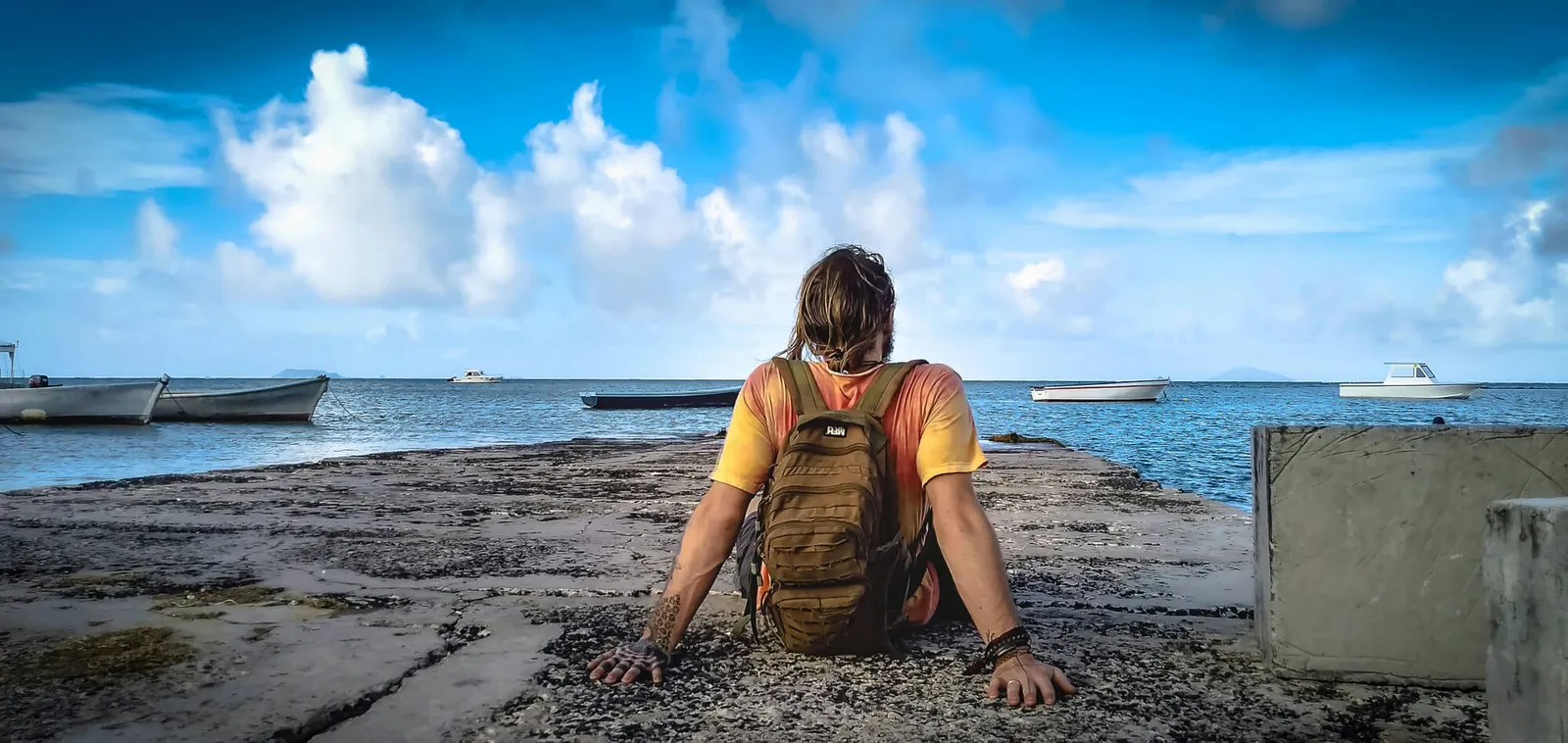 backpacking chilling by the ocean in mauritius