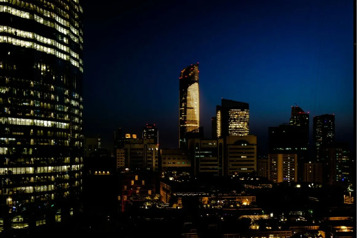 Abu Dhabi buildings lit up at night