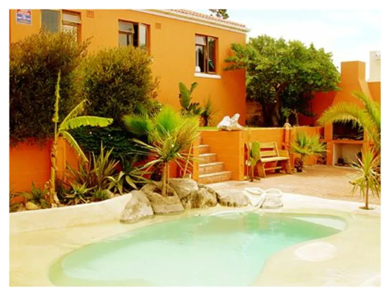 Cape Surf Hostel best hostels in Cape Town. African architecture and an outdoor pool, an oasis in Cape Town.