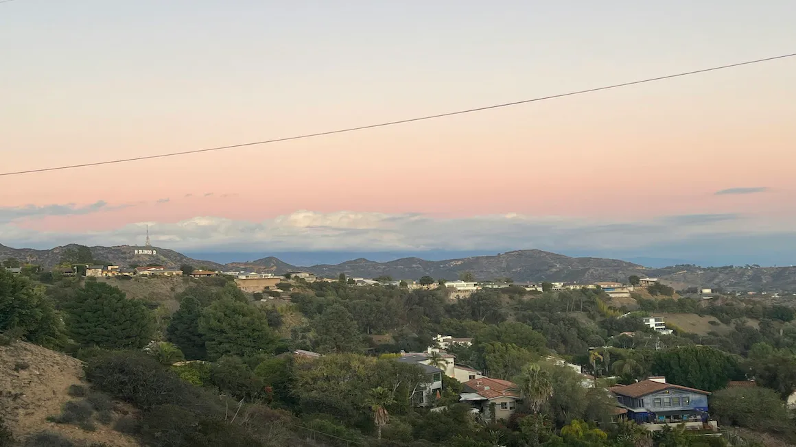 hollywood sign under a pink sunset as sign from a hiking trail in los angeles california usa United States of America.