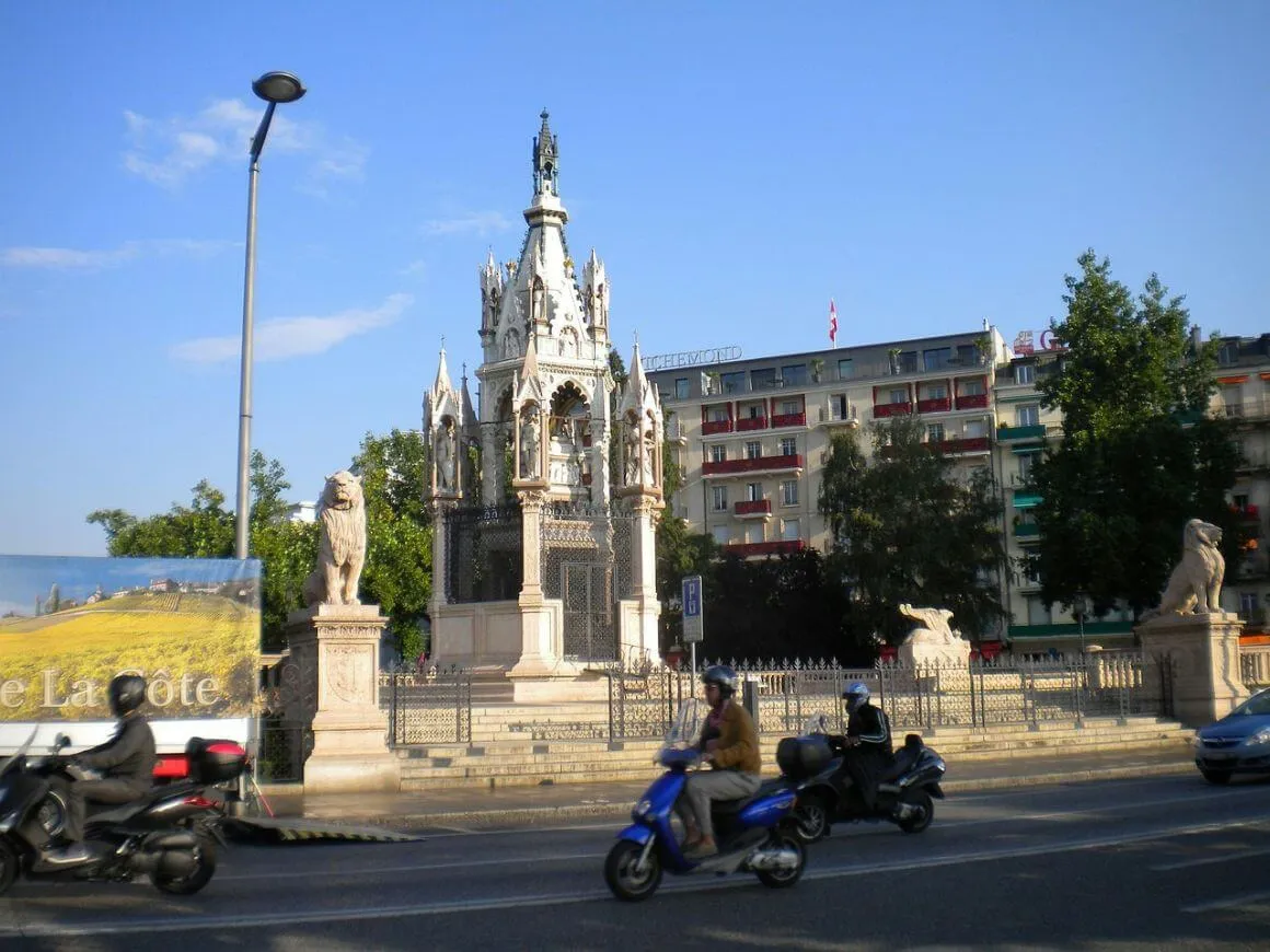 geneva old town monument with scooters