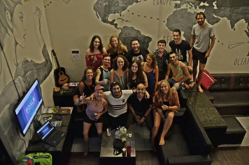 Dorms Best Hostel in Kuala Lumpur. Friends in the TV room common area