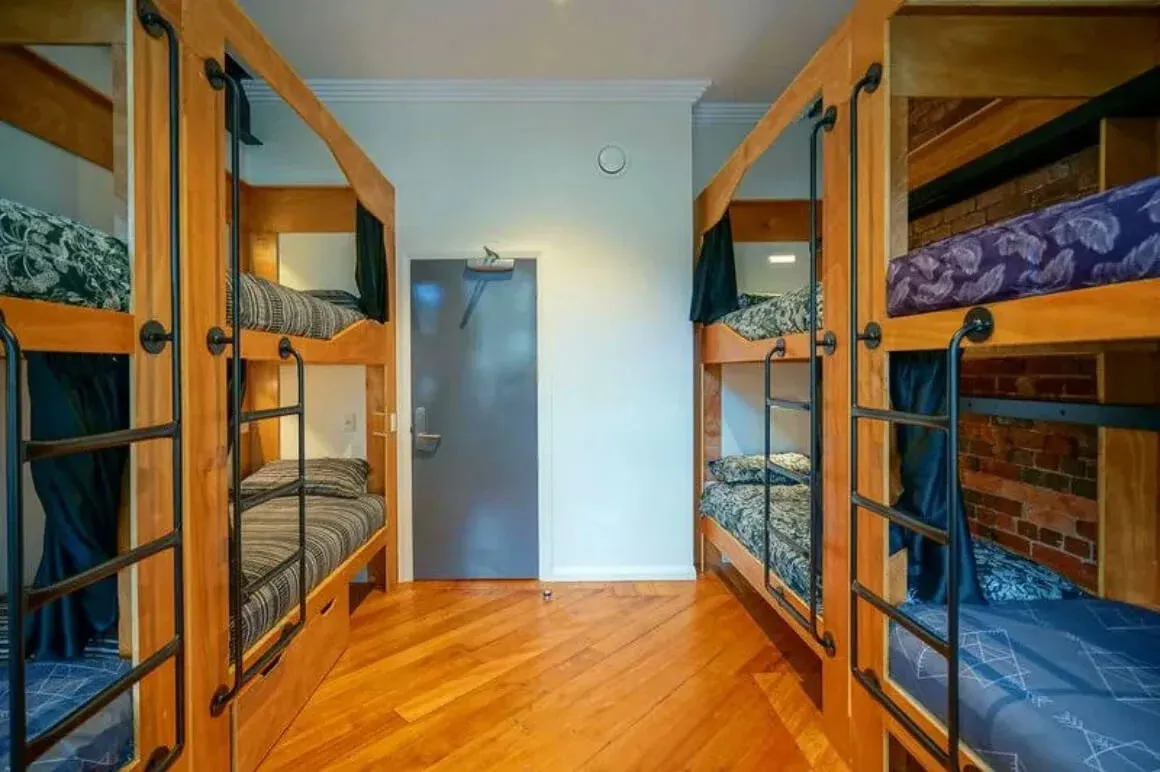 The Marion Hostel in Wellington. Dorm beds in a tidy room.