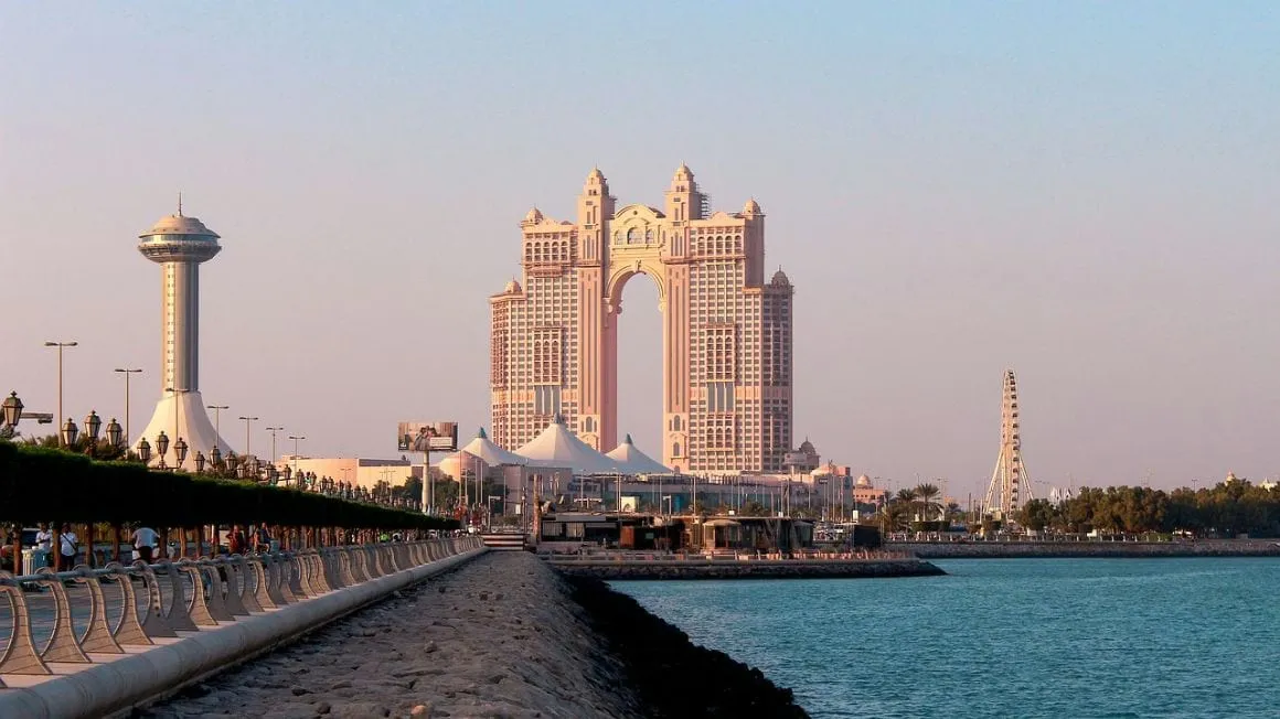 View down the Corniche Abudhabi. Looking at the Abu Dhabi skyline along the water.