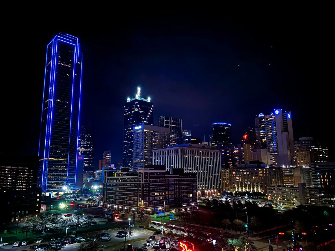 sparkling skyline of dallas in the dark